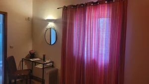 Garden view from Papoila Room – peaceful scenery at Madrugada Turismo Rural.