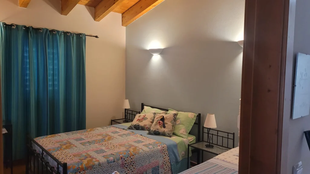 Full view of Trevo Room with double and single bed. good