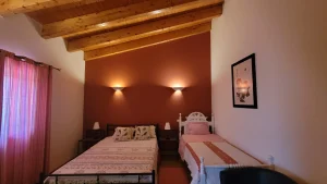Interior of Papoila Room – spacious countryside retreat in Évora with natural light.