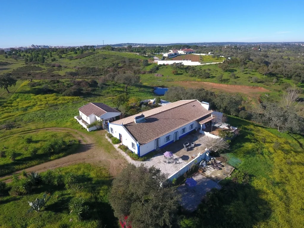 Aerial view of Madrugada Turismo Rural surrounded by Alentejo nature"