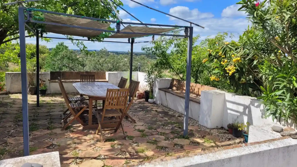 Relaxing terrace with countryside views at a rural B&B near Évora.